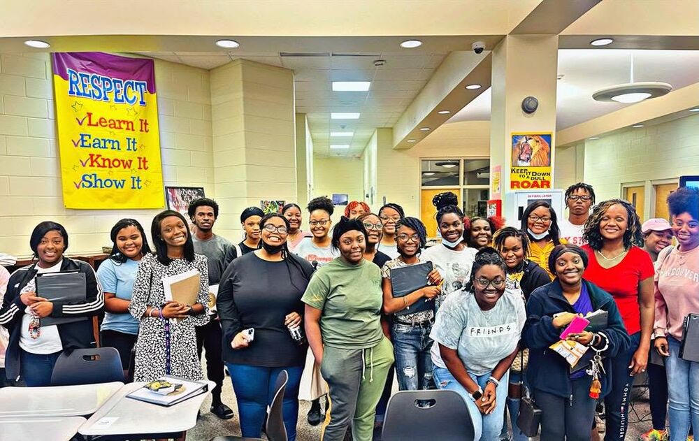 Dr. Bell with students at an ACT prep session